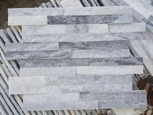 grey quartz cladding on kitchen wall